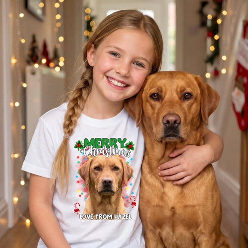 Girl hugging her fox red Labrador in a white kids' Merry Christmas Love From pet face t-shirt