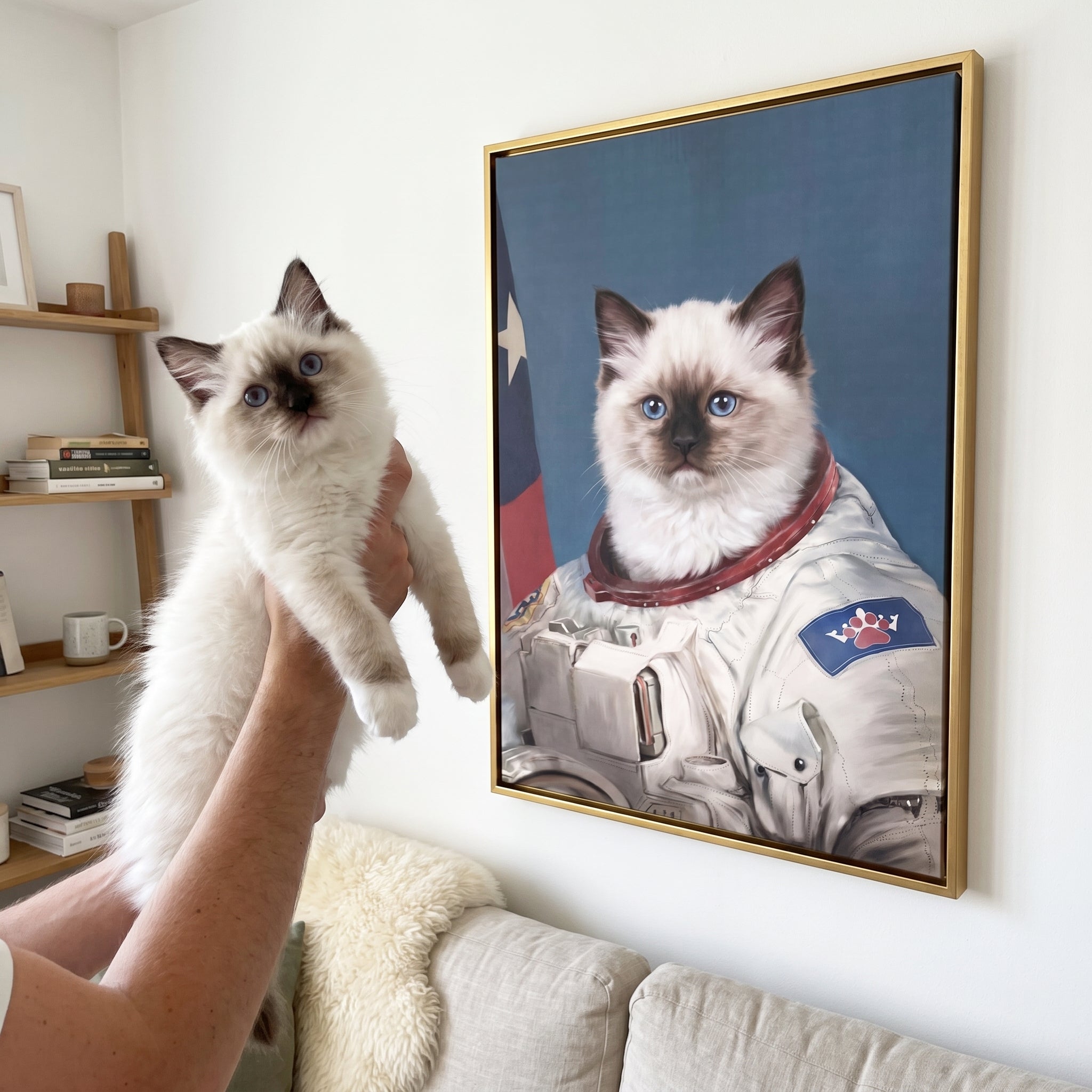 White ragdoll cat next to its The Astronaut custom pet canvas