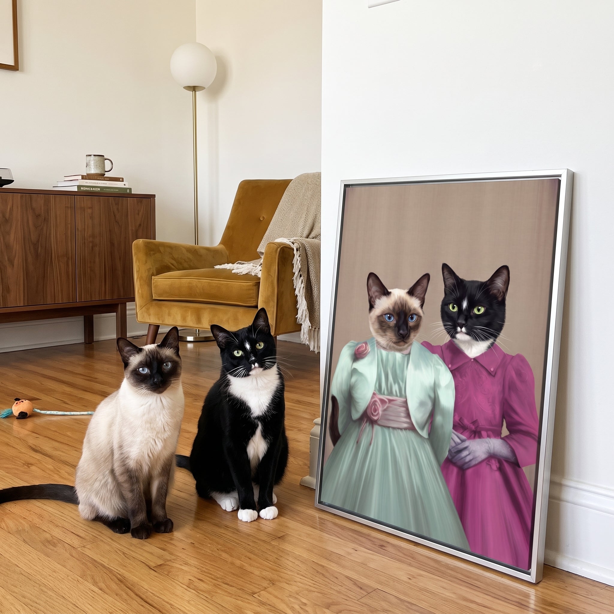 Siamese cat and tuxedo cat next to its The Sisters custom pet canvas