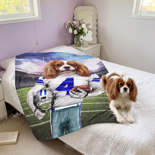 Cavalier King Charles spaniel with The Dallas Goodboys custom pet blanket: on the bed