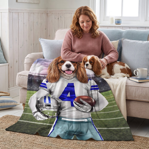 Cavalier King Charles spaniel with The Dallas Goodboys custom pet blanket: owner + pet on sofa