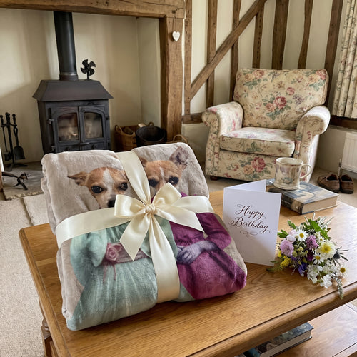 The Sisters custom pet blanket wrapped as a gift